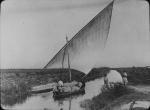 Sailboat with products on rural Spanish river, undated