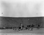 Michigan State vs. University of Michigan football action shot, 1954