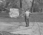 Sidewalk being cleaned next to the Rock, October 16, 1984