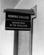 Close up of the Honors College sign, 1957