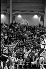 Magic Johnson jumps to receive ball, 1979