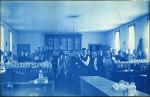 56. Students posing in a laboratory classroom, circa 1888.