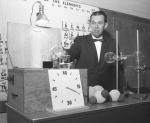 Dr. Frederic B. Dutton with chemical apparatus, 1960 