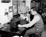 Engineering students calibrating a signal generator, 1947