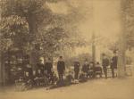 Male students pose outdoors near trees, date unknown