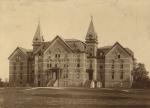Front view of the original Wells Hall, date unknown