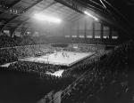 A large crowd watches an MSU basketball game, 1940
