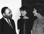 MLK Jr. speaks with two women, 1966