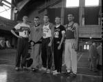 Cross Country team members in Jenison Field House, circa 1950s