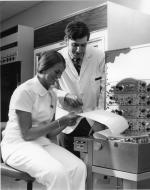 Howard Brody and unidentified nurse, c. 1974