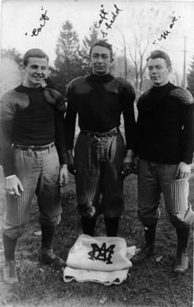 Three M.A.C. football players, 1908 title=Three M.A.C. football players, 1908