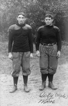 Two M.A.C. football players, circa 1900-1909 title=Two M.A.C. football players, circa 1900-1909